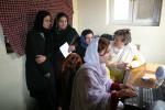 Afganistanilaisia naisia tietokoneen ääressä, kuva Rauli Virtanen
